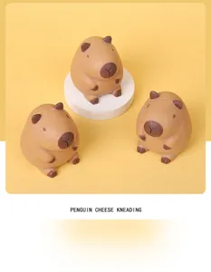 Detailed view of three cute Capybara slow rebound squishy toys for stress relief on yellow background