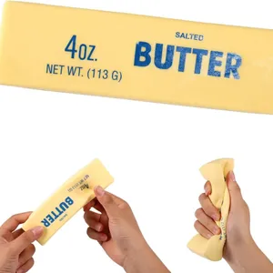 Jouet anti-stress squishy en forme de bâton de beurre jaune avec texture souple