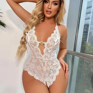 Detailed view of a white floral lace teddy bodysuit featuring a heart buckle and bows