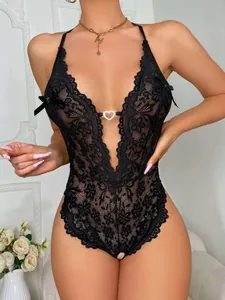 Detailed view of a sexy black floral lace bodysuit featuring a deep V-neck and heart charm.