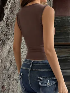 Back view of a chic brown Y2K street style cropped sleeveless tank top on a female model