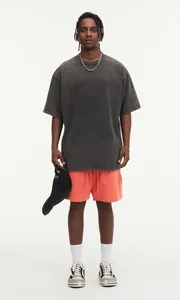 Vooraanzicht van een oversized gewassen antracietkleurig vintage katoenen T-shirt van 230g