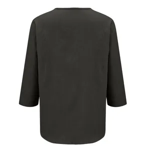 Vue arrière du haut ample en coton et lin noir au style chic et minimaliste