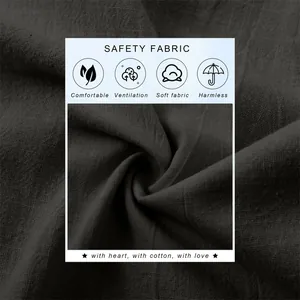 Texture macro détaillée de tissu en lin et coton gris foncé respirant pour chemise