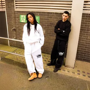 Men's high street style oversized sweatshirt and sweatpants set in black and white