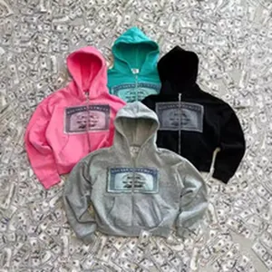 Set of four colorful zip-up hoodies with graphic chest patch on money background