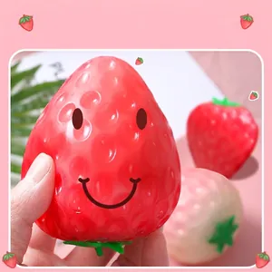 Cute strawberry stress relief squishy toy with smiley face for adults and kids