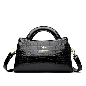 Elegant black crocodile embossed patent leather handbag with gold-tone kangaroo logo