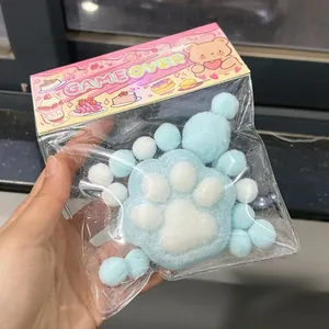 Giocattolo antistress morbido a forma di zampa di gatto blu a lento ritorno.