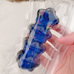 Blaue glitzernde blumenförmige Squishy Spielzeug mit langsamem Rückprall