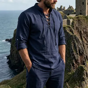 Detail of men's medieval vintage linen henley shirt with navy blue lace-up collar.