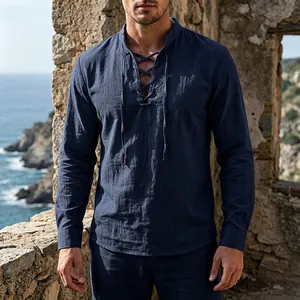 Vintage navy blue linen lace-up Henley shirt for men in scenic outdoor setting