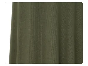 Macro view of olive green ribbed knit fabric texture on a high-waist pencil skirt