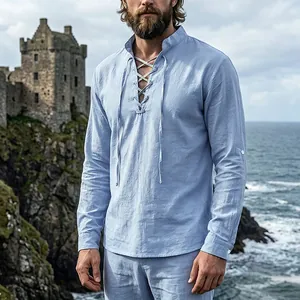 Detail view of light blue medieval men's linen shirt with lace-up stand collar