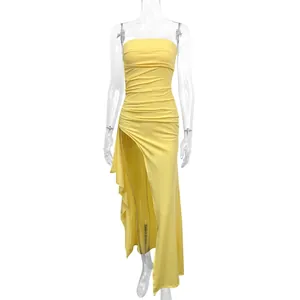 Detailed view of yellow strapless dress with sexy high side slit and ruched bodycon design