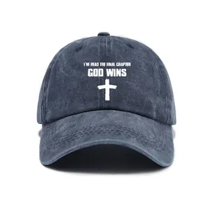 Washed denim baseball cap featuring God Wins text and a white cross symbol print