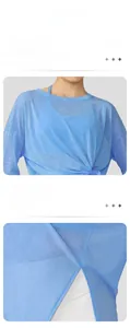Close-up of blue slub yarn yoga top featuring crew neck and side slit details.