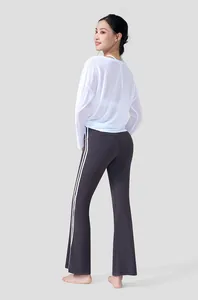 Detailed back view of a breathable white slub yarn long-sleeve yoga cover-up for women