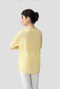Back view of a lightweight yellow slub yarn yoga top for women, loose fit for fitness.