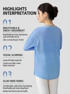 Breathable blue slub yarn yoga top with loose fit and long sleeves for women