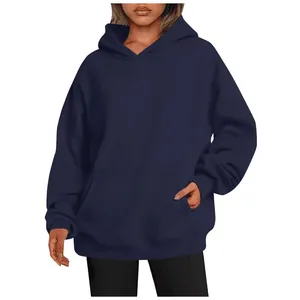 Close-up of navy blue oversized women's hoodie with a functional front pocket.