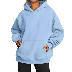 Detail of oversized light blue hoodie for women with large front kangaroo pocket