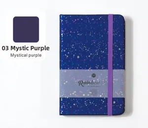 Close-up of glitter hardcover notebook in mystical purple with elastic band closure