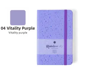 Close-up view of a purple glitter hardcover notebook with vitality purple swatch