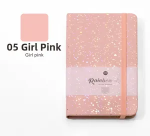 Detailed view of the A6 glitter pink hardcover notebook with elastic closure strap.