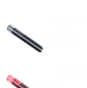 Macro detail of 3.4mm universal fountain pen ink cartridges in black and red colors
