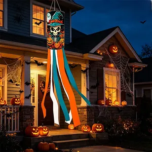 Detail of Halloween windsock featuring spooky skeleton and pumpkin print for yard decor