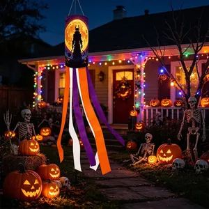 Spooky Halloween windsock flag with silhouette design in an outdoor night yard scene