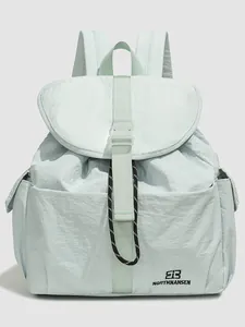 Light mint green minimalist nylon backpack with NORTHNANSEN logo for school and travel
