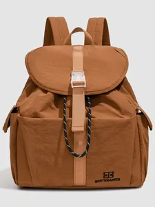 Stylish brown nylon backpack for women, perfect for college students and casual commuting.