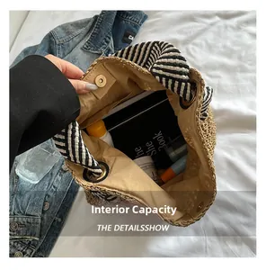Large woven straw tote bag showing its spacious interior capacity and lining detail