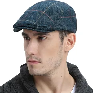 Detailed view of blue plaid wool flat cap in classic British vintage style