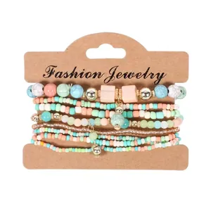 Set di 8 braccialetti elastici bohémien con perline colorate e vivaci accenti dorati