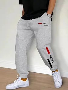 Pantaloni da jogging grigi da uomo con stampa Paris e dettagli a strisce atletiche