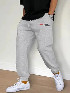 Pantaloni sportivi grigi da uomo con stampa Paris per fitness e abbigliamento casual.