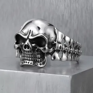 Macro view of detailed 3D skull and bone link design on punk titanium steel bracelet