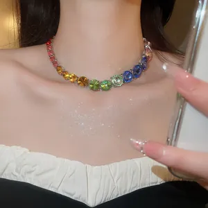 Macro detail showing vibrant rainbow gradient crystal necklace for elegant evening gala