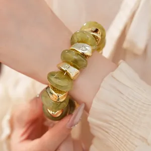 Elegante elastische armband met groene acryl en gouden geometrische kralen voor dames