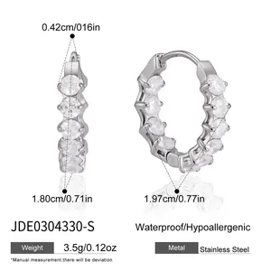 Detailed view of stainless steel hoop earrings with round white zircons and dimensions
