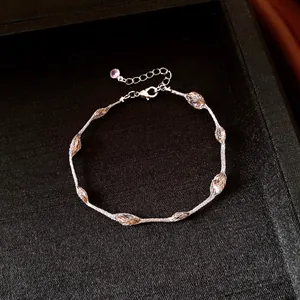Detailed view of a niche design bracelet with colorful mesh-wrapped candy beads.