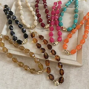 Colorful twisted acrylic oval bead necklaces with adjustable gold chain extension