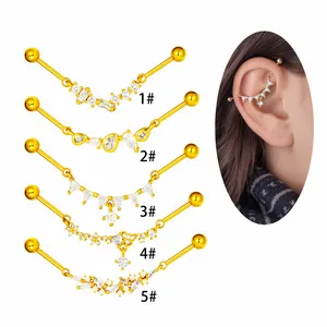 Golden stainless steel industrial barbell piercings set with various zirconia designs