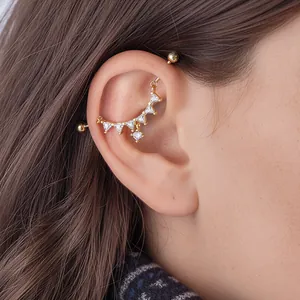 Stylish gold stainless steel industrial barbell with marquise zirconia cluster on ear