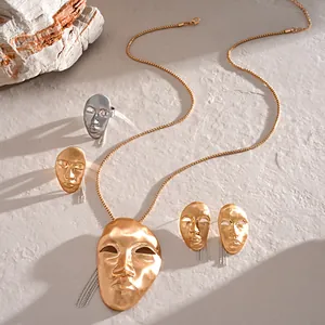 Artistic metallic human face mask jewelry set including necklace, ring, and earrings