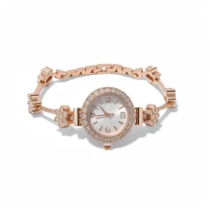 Elegant rose gold women's watch featuring a sparkling rhinestone flower bracelet design