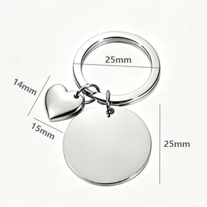 Detail of stainless steel heart keychain showing 25mm round tag and heart charm